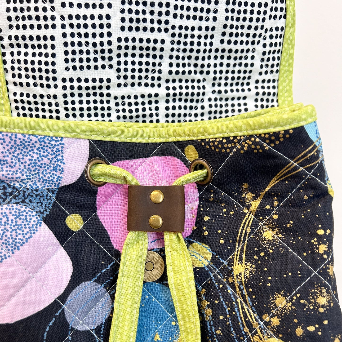 Pembina Backpack in Black and Teal Flirtation