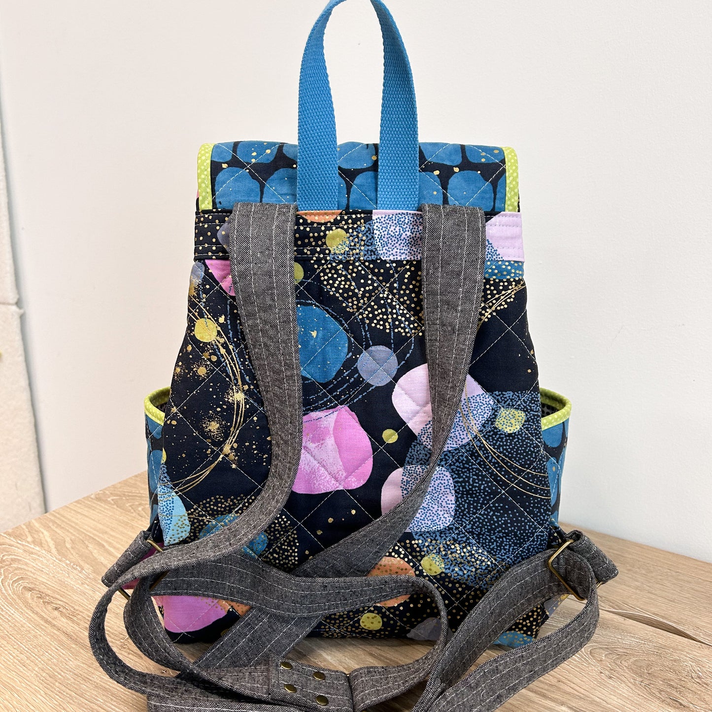 Pembina Backpack in Black and Teal Flirtation