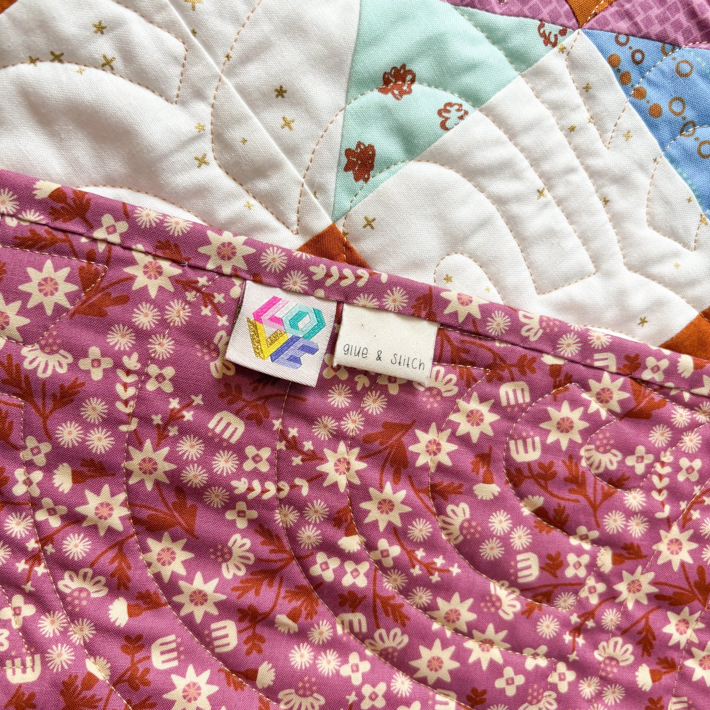 Buckeye Bloom Throw Quilt in Fluffy Sheep