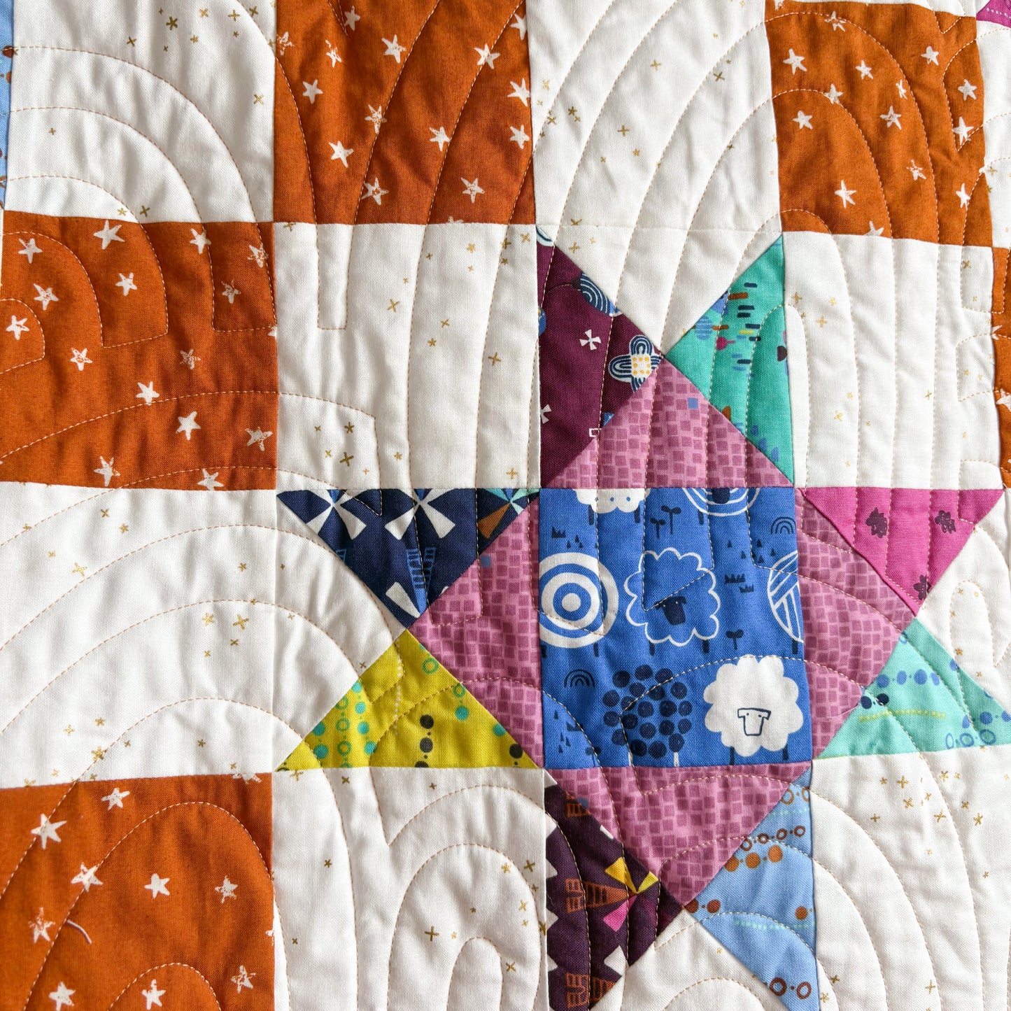 Buckeye Bloom Throw Quilt in Fluffy Sheep