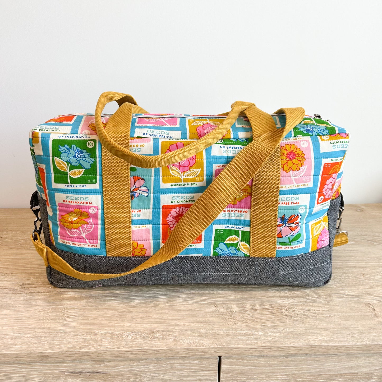 Skinny Travel Duffle in Blue Flowerland Seed Packets