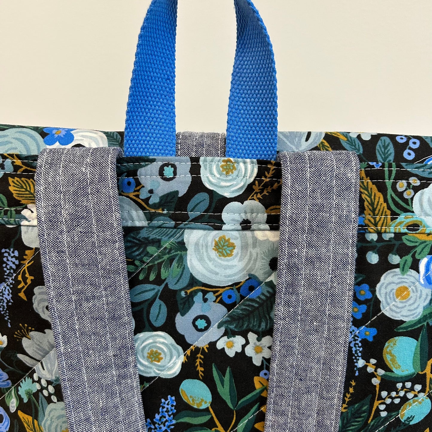 Range Backpack in Blue and Black Garden Party